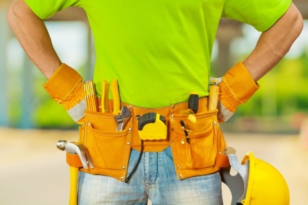 maintenance green shirt toolbelt